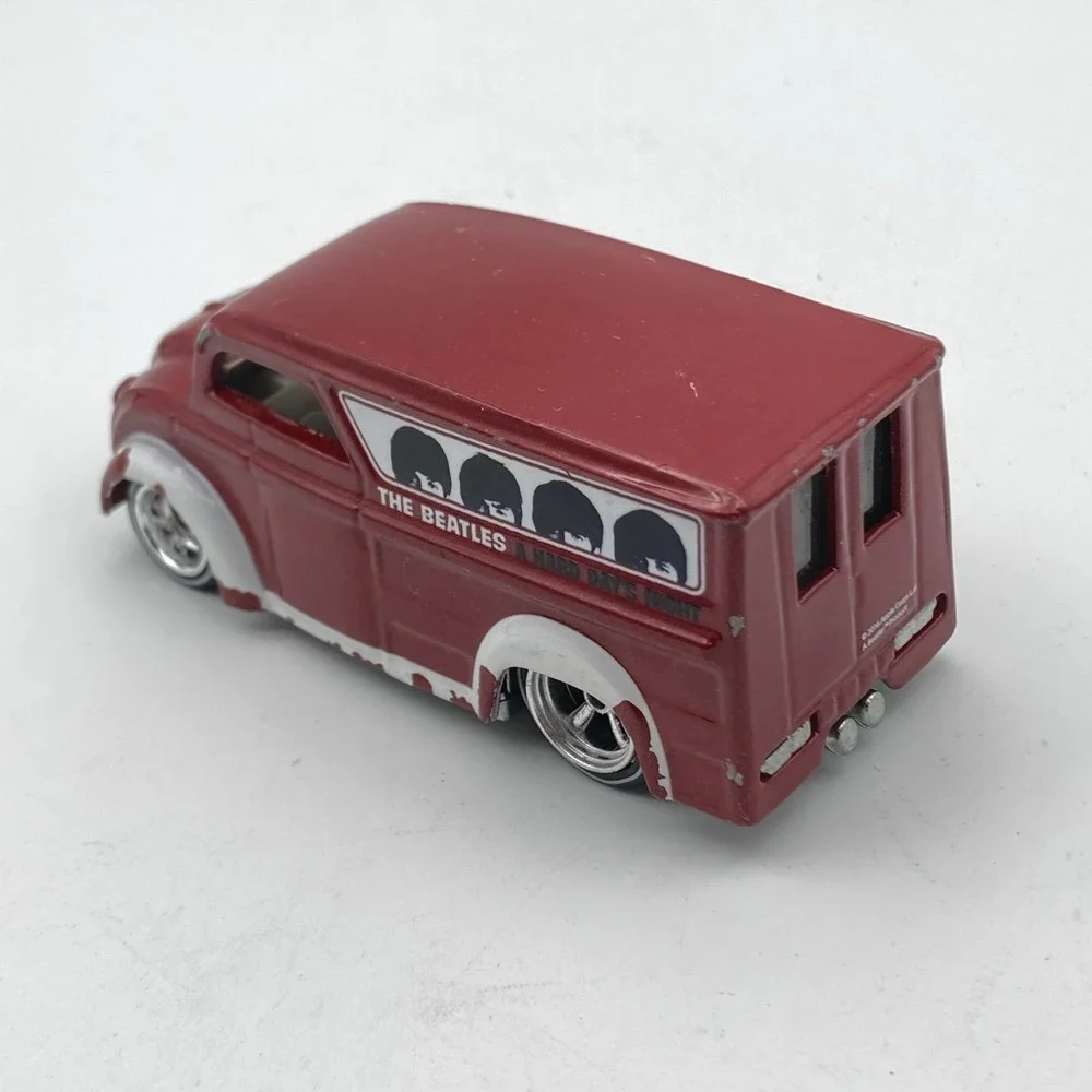 Hot Wheels Beatles Dairy Delivery Milk Truck Plastic Man Skullduggery / Lot #10